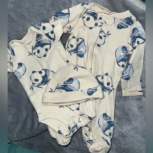 newborn size, cream color with panda detail, good condition, semi-new